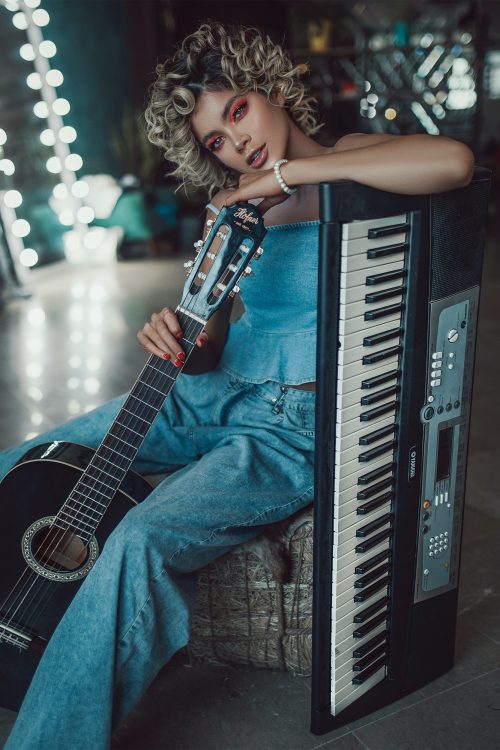 musician with guitar and keyboard